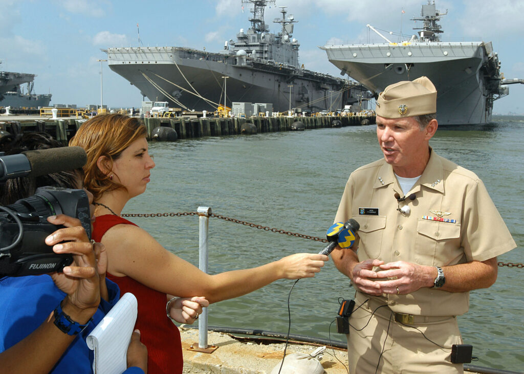 Vice Adm. Mark Fitzgerald talks with WTKR Channel 3 Reporter Stacy Davis in 2005. U.S. Navy photo by Photographer's Mate 1st Class Gregory A. Roberts