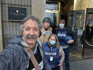 Fox news cameraman Pierre Zakrzewski and other journalists.